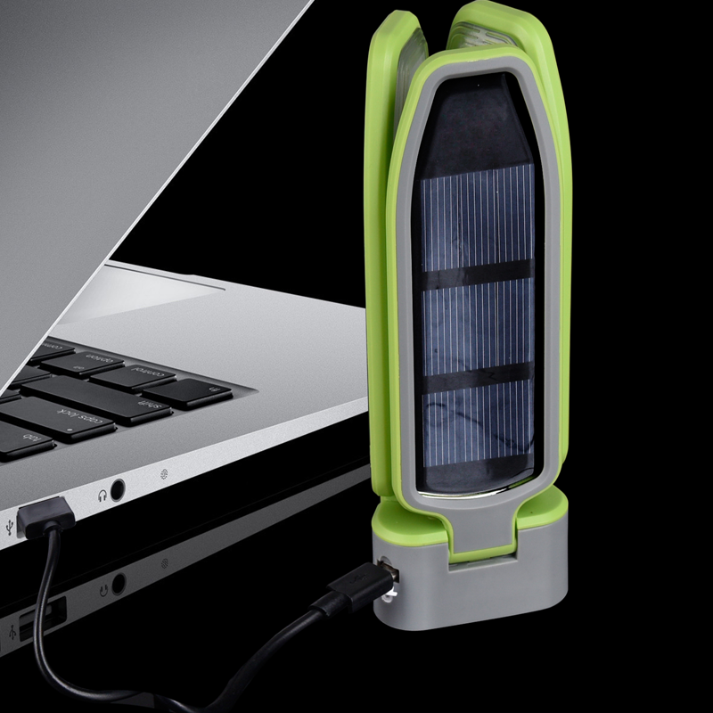 SURYA Solarlampe Größenvergleich Hand hält Lampe
