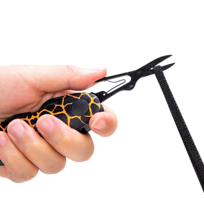 munkees Taschenmesser Giraffe Größenvergleich neben einer Hand